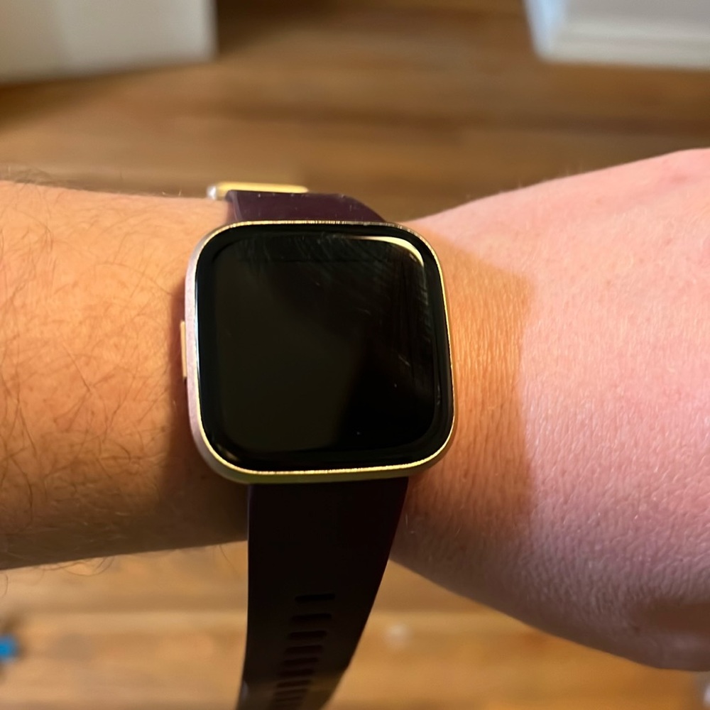 Very slightly used FitBit Versa 2, with charger.